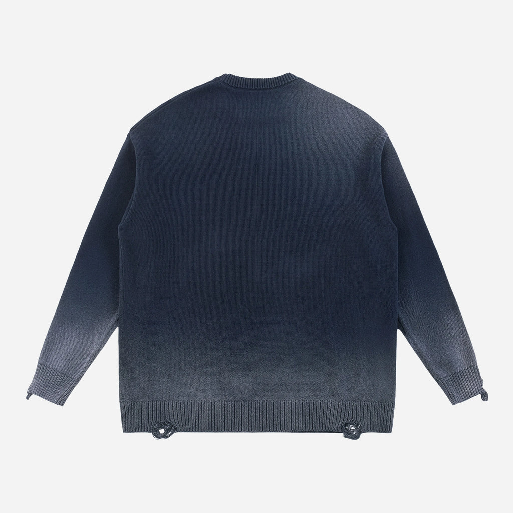 Navy blue sweater on a light gray background