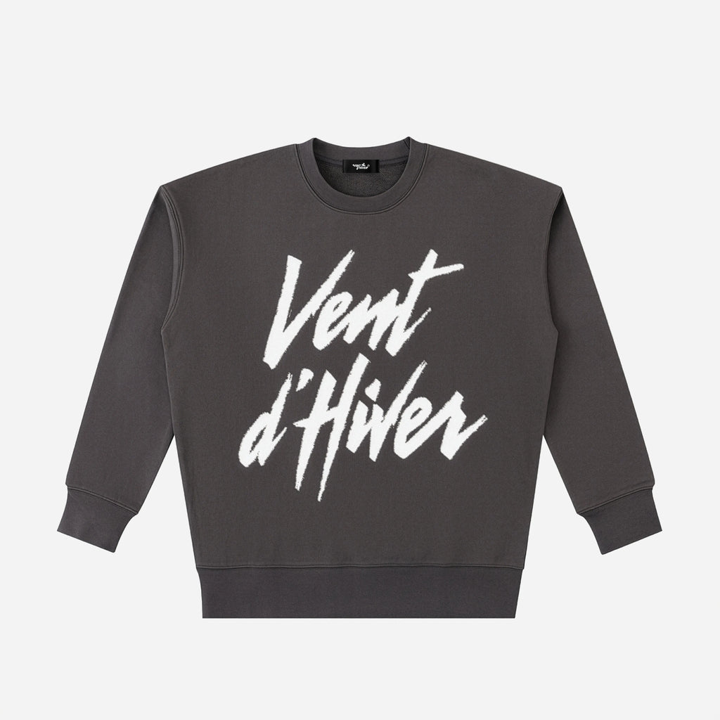 Dark gray sweatshirt with white text 'Vent d'Hiver' on a light gray background